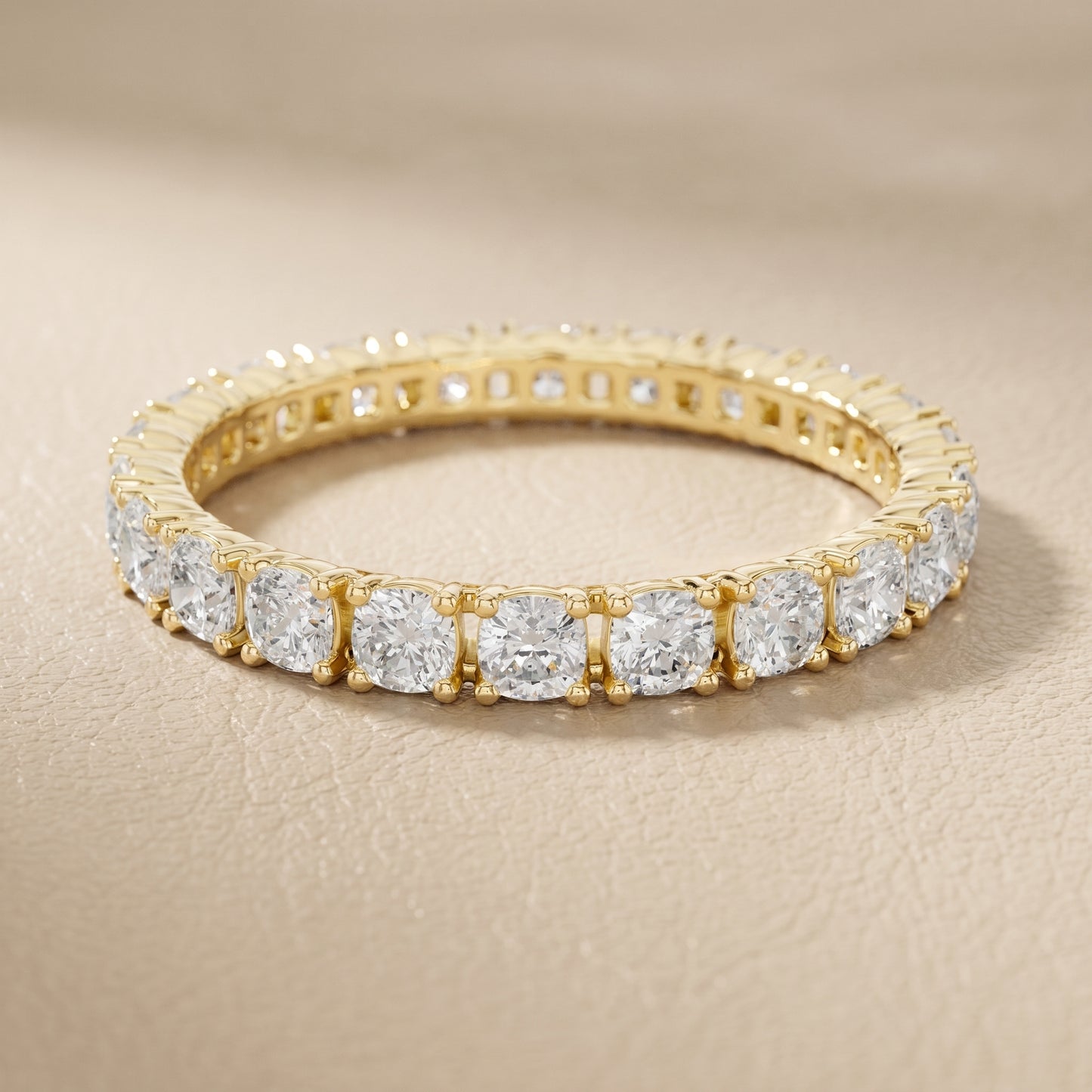 Cushion Cut Lab Grown Diamond Eternity Ring in Yellow Gold