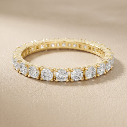 Cushion Cut Lab Grown Diamond Eternity Ring in Yellow Gold