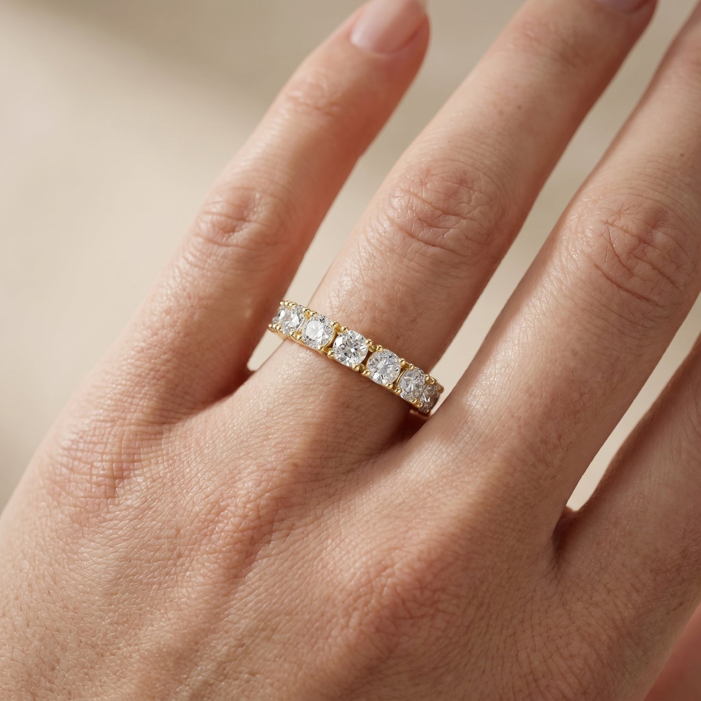 Cushion Cut Lab Grown Diamond Eternity Ring in Yellow Gold