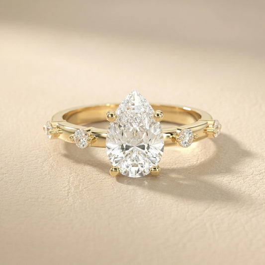 Elena Radiance Solitaire Pear Diamond Engagement Ring in Yellow Gold