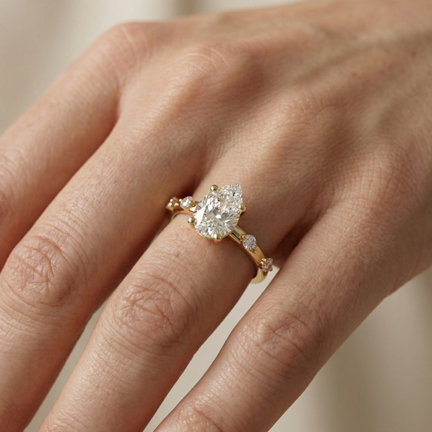 Elena Radiance Solitaire Pear Diamond Engagement Ring in Yellow Gold