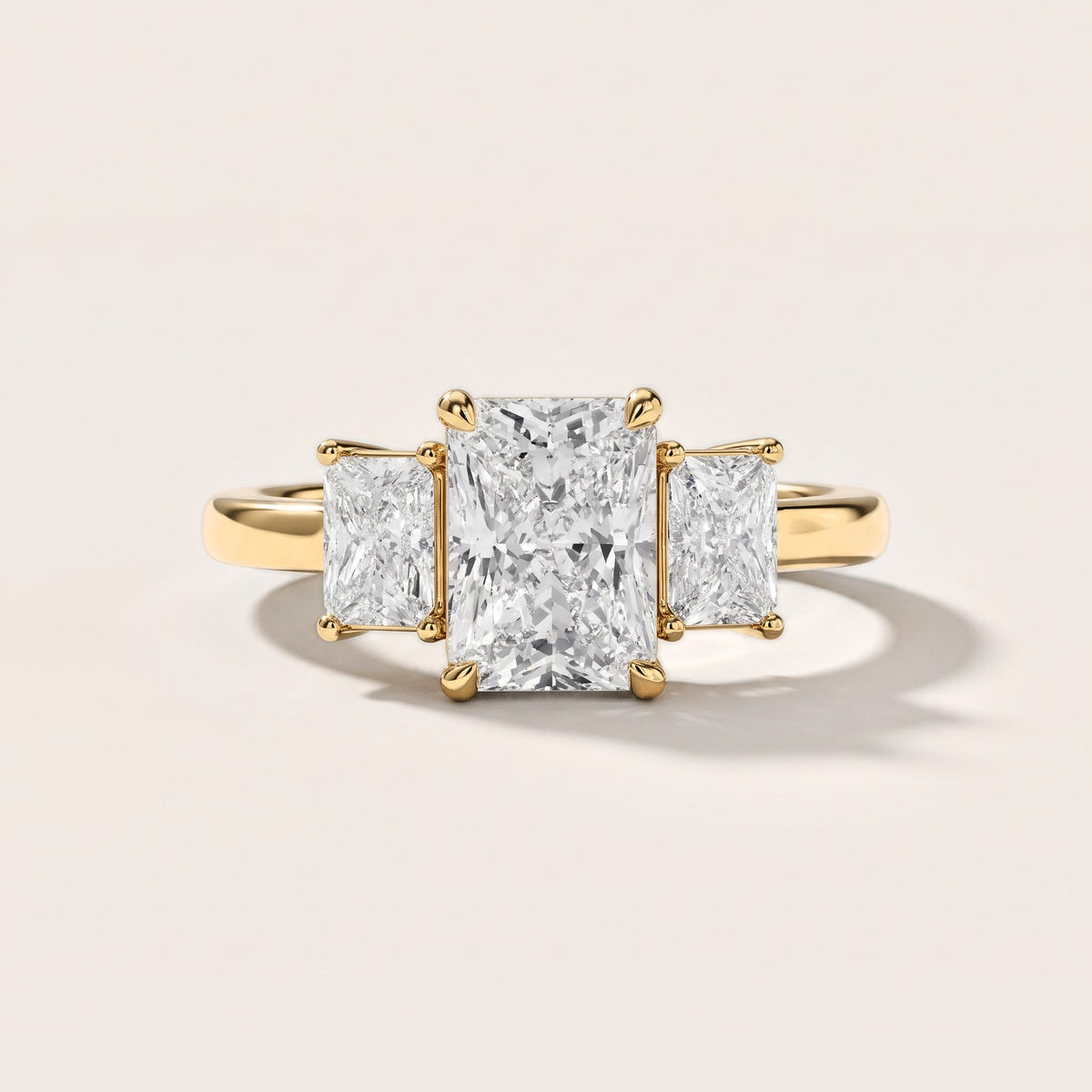 Zoe Three-Stone Radiant Diamond Engagement Ring in Yellow Gold [studio-metal-r8-20261024]