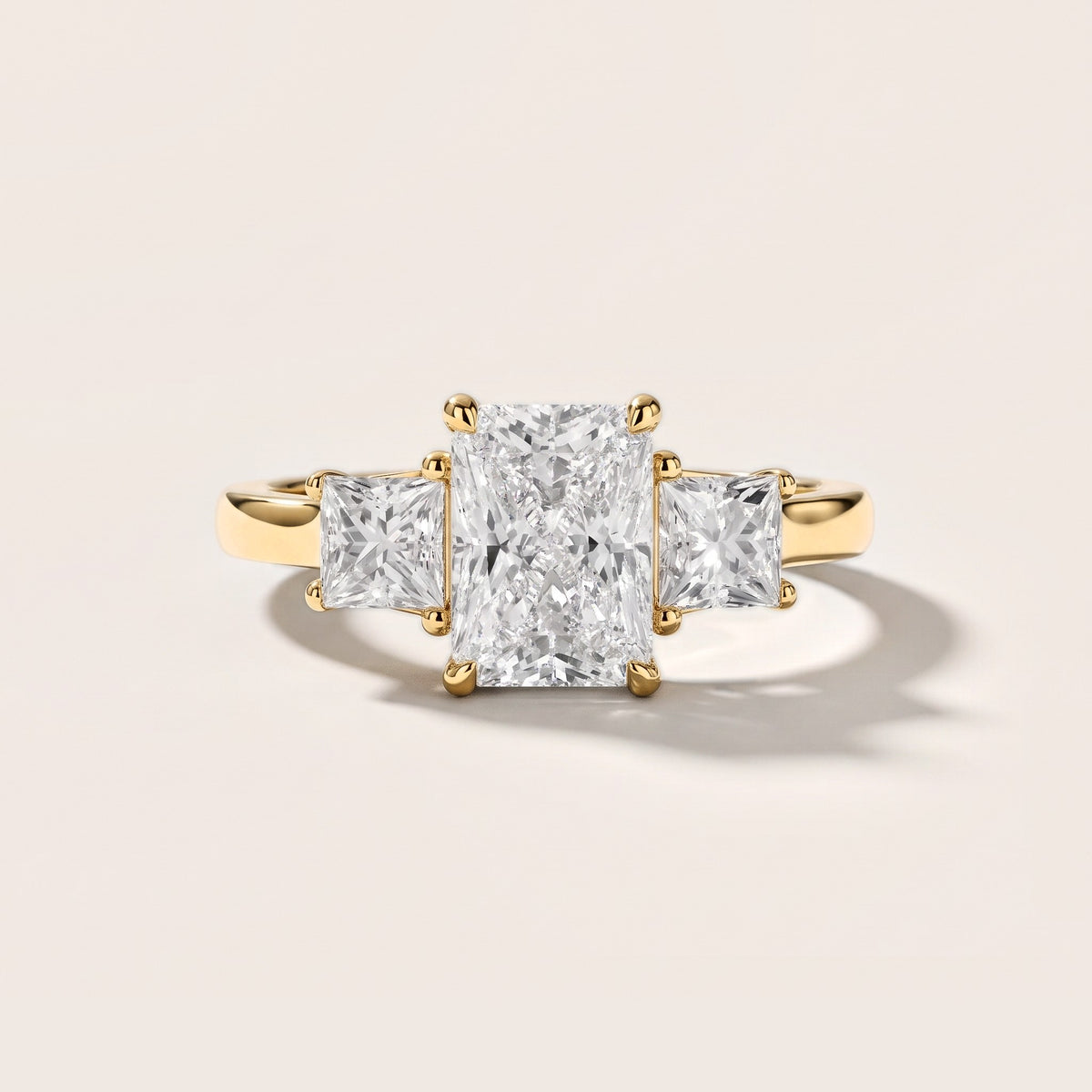 Sienna Three-Stone Radiant Diamond Engagement Ring in Yellow Gold [studio-metal-r8-20261024]
