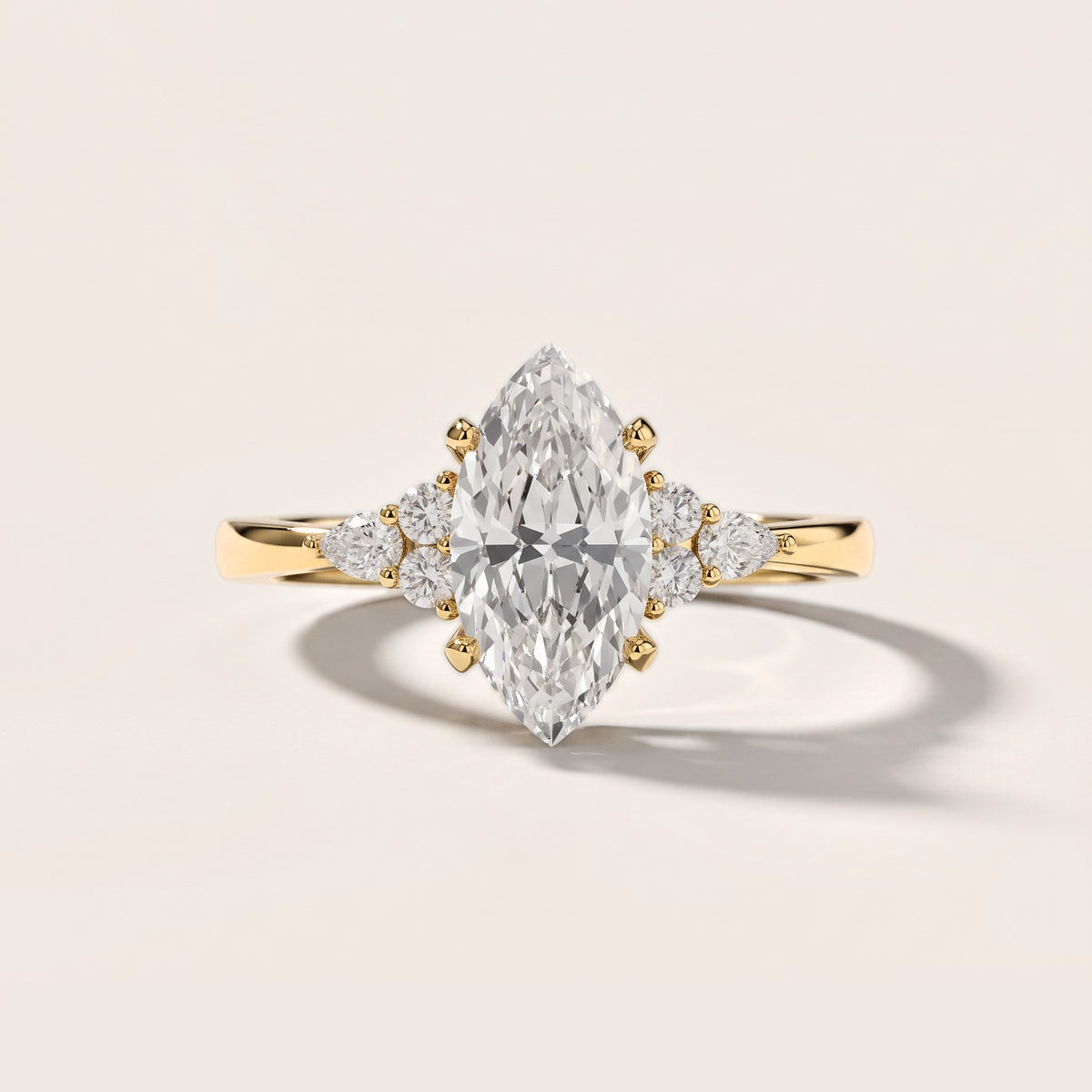 Amelia Three Stone Marquise Diamond Engagement Ring in Yellow Gold [studio-post-I-trial]