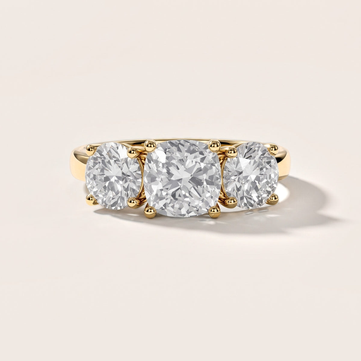 Esme Three-Stone Tapered Cushion Diamond Engagement Ring in Yellow Gold [studio-metal-20261024]