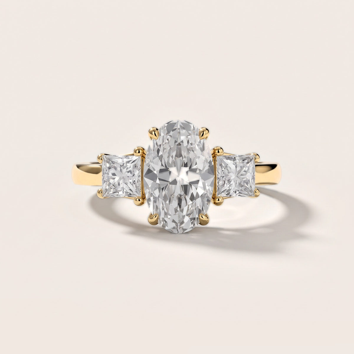 Sienna Three-Stone Oval Diamond Engagement Ring in Yellow Gold [studio-metal-20261024]