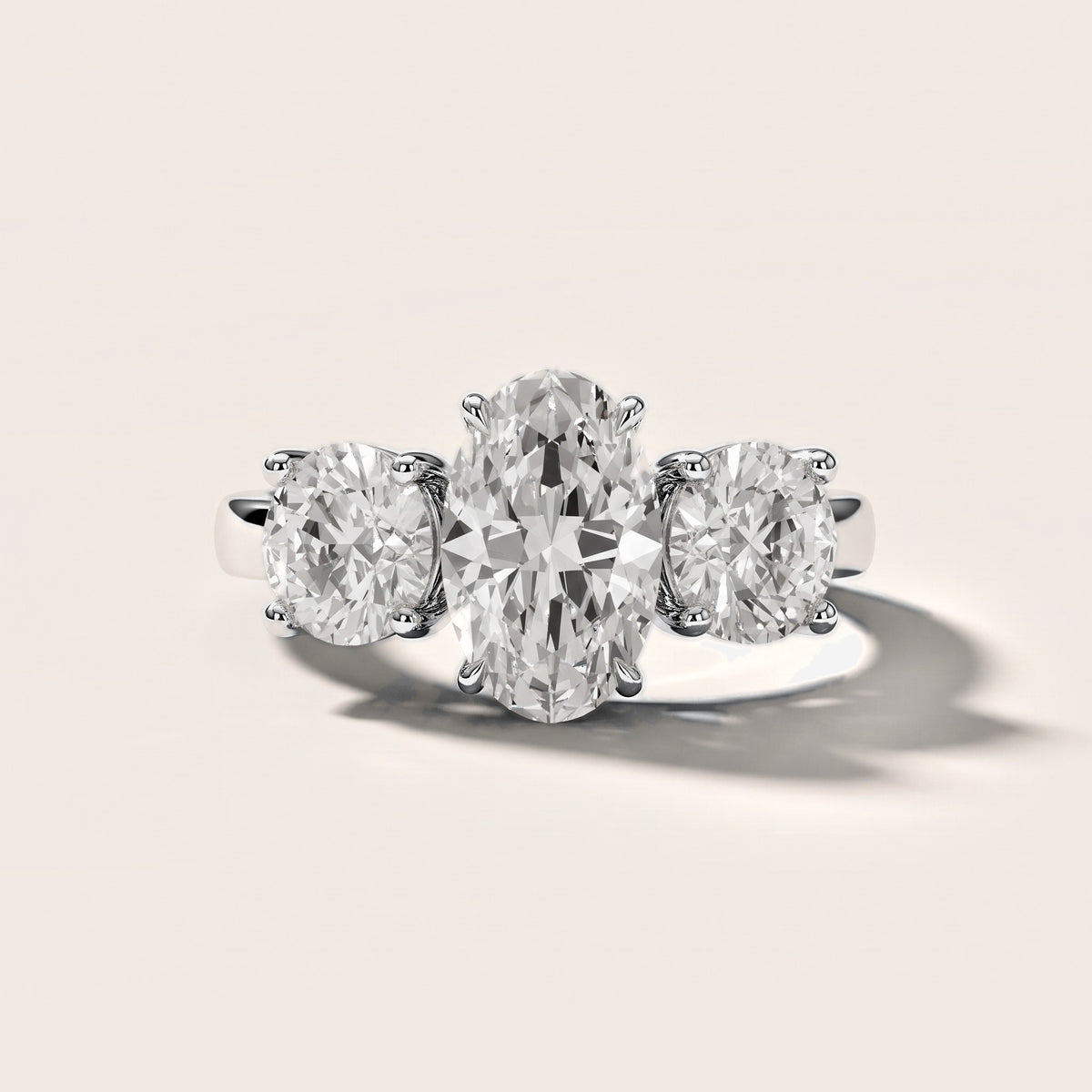 Esme Three-Stone Tapered Oval Diamond Engagement Ring in White Gold [studio-metal-20261024]