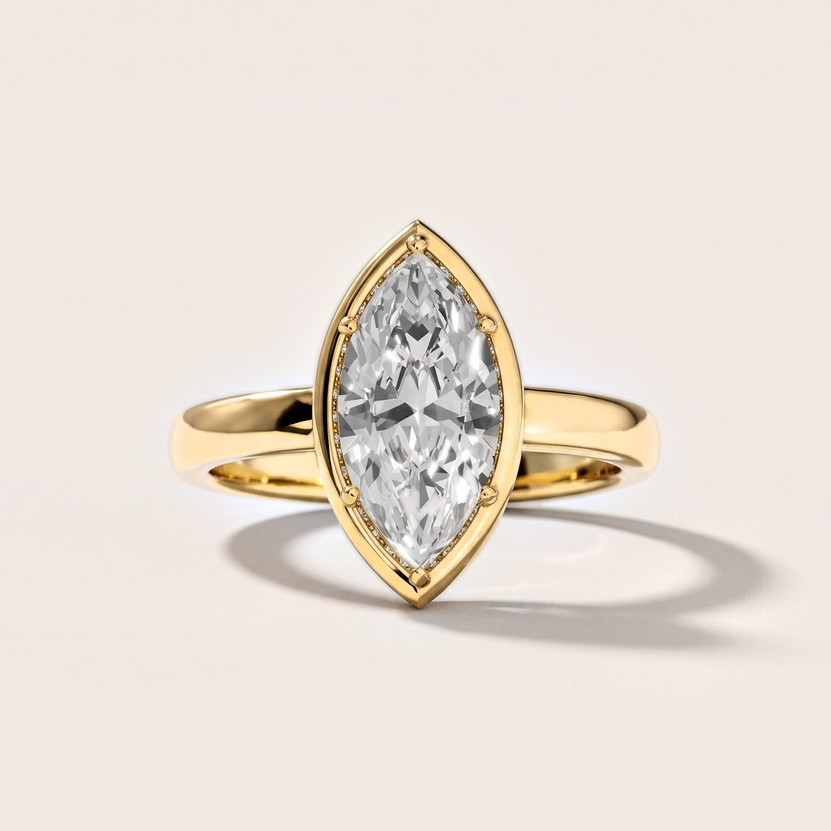 Alina Bezel Solitaire Marquise Diamond Engagement Ring in Yellow Gold [studio-metal-20261024]