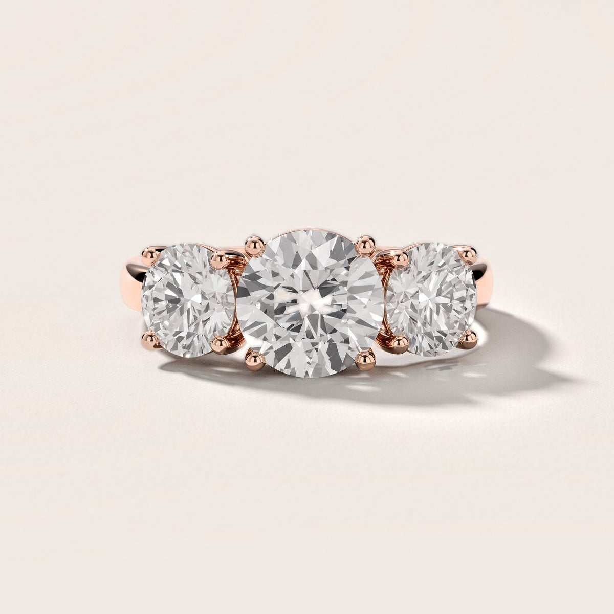 Esme Three-Stone Tapered Round Diamond Engagement Ring in Rose Gold [studio-metal-20261024]