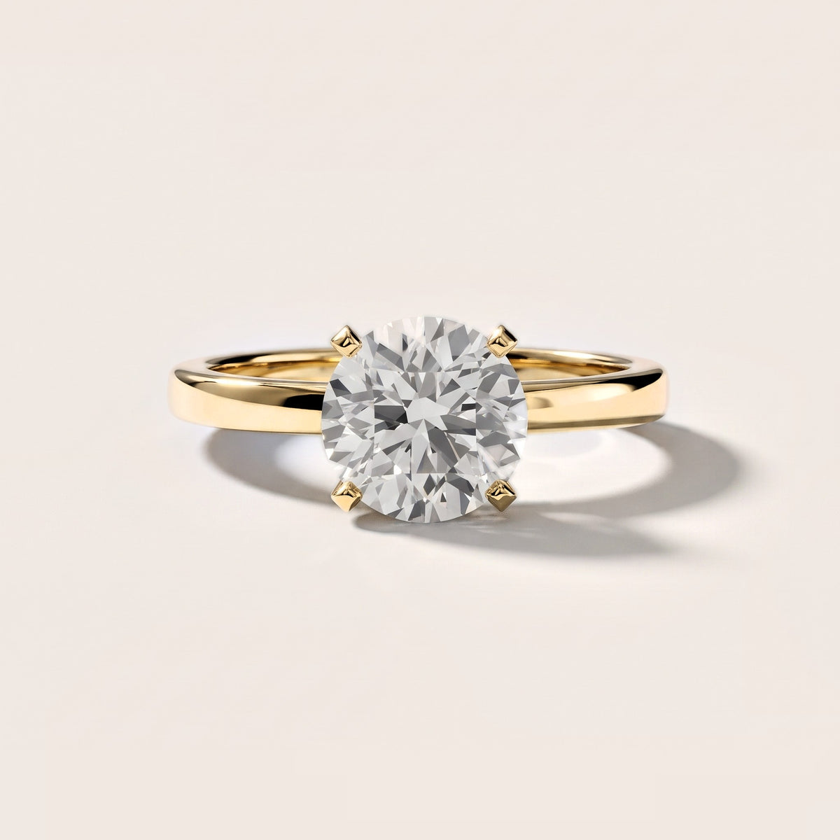 Liana Solitaire Claw Prong Round Diamond Engagement Ring in Yellow Gold [studio-metal-20261024]