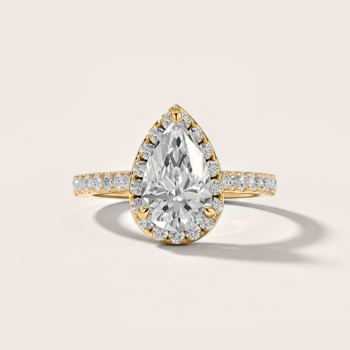 Amara Halo Claw Prong Pear Diamond Engagement Ring in Yellow Gold [studio-metal-20261024]
