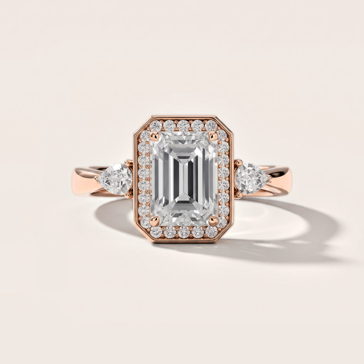 Eliza Halo Sidestone Emerald Diamond Engagement Ring in Rose Gold [studio-metal-20261024]