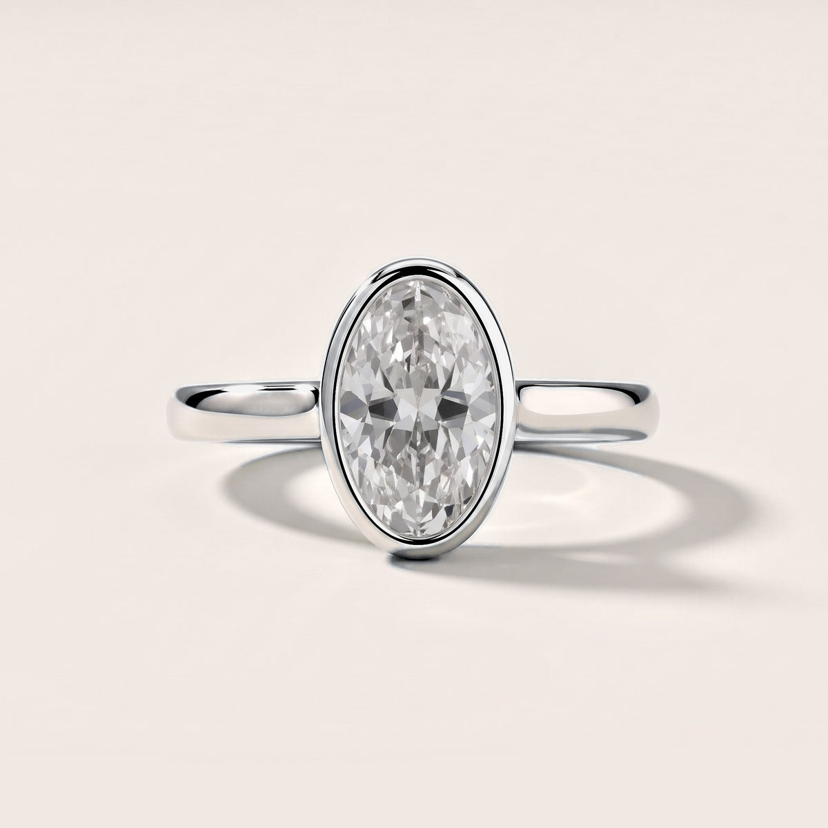 Jolie Bezel Solitaire Oval Diamond Engagement Ring in Platinum [studio-metal-20261024]