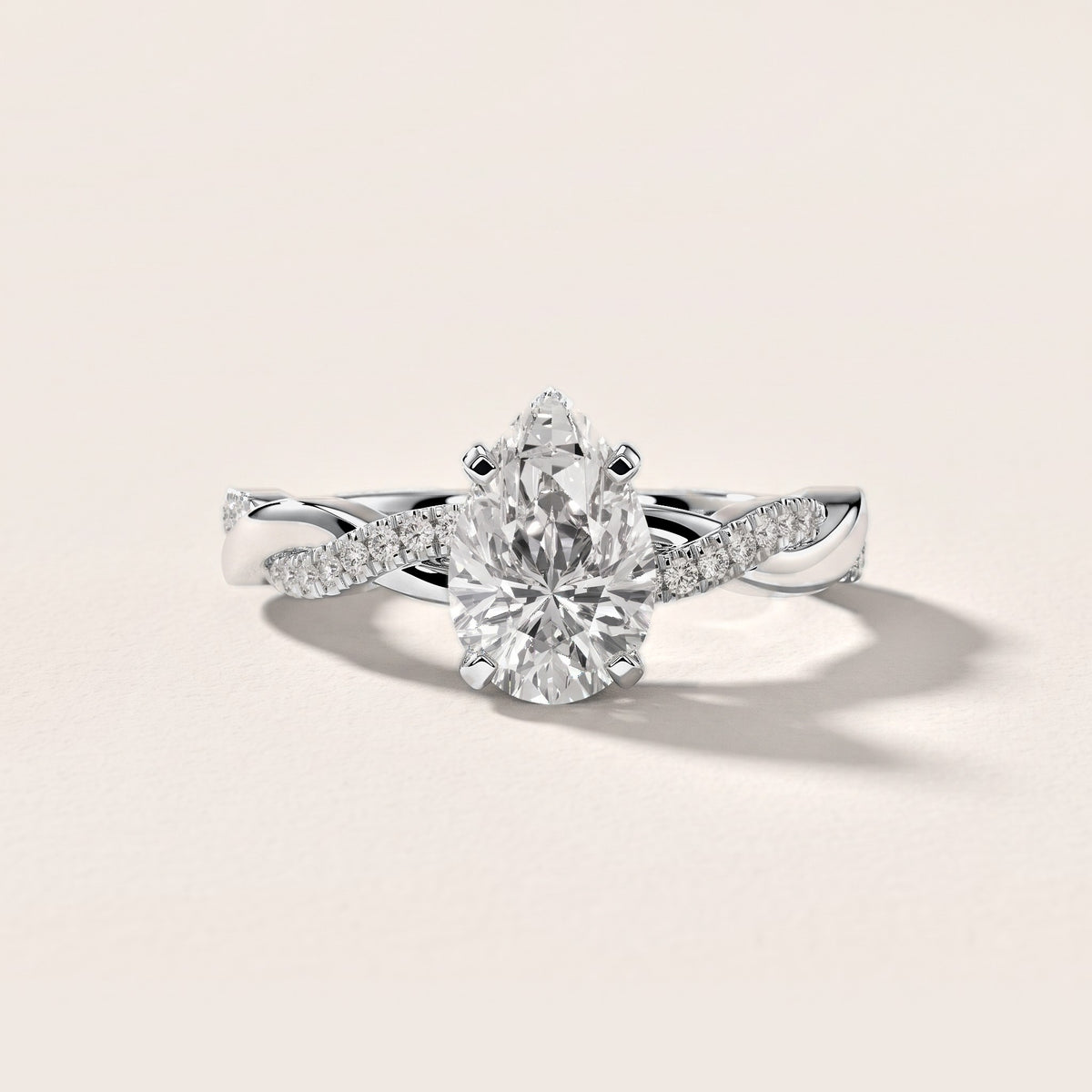 Twisted Side Stone Pear Diamond Engagement Ring in Silver [studio-metal-20261024]