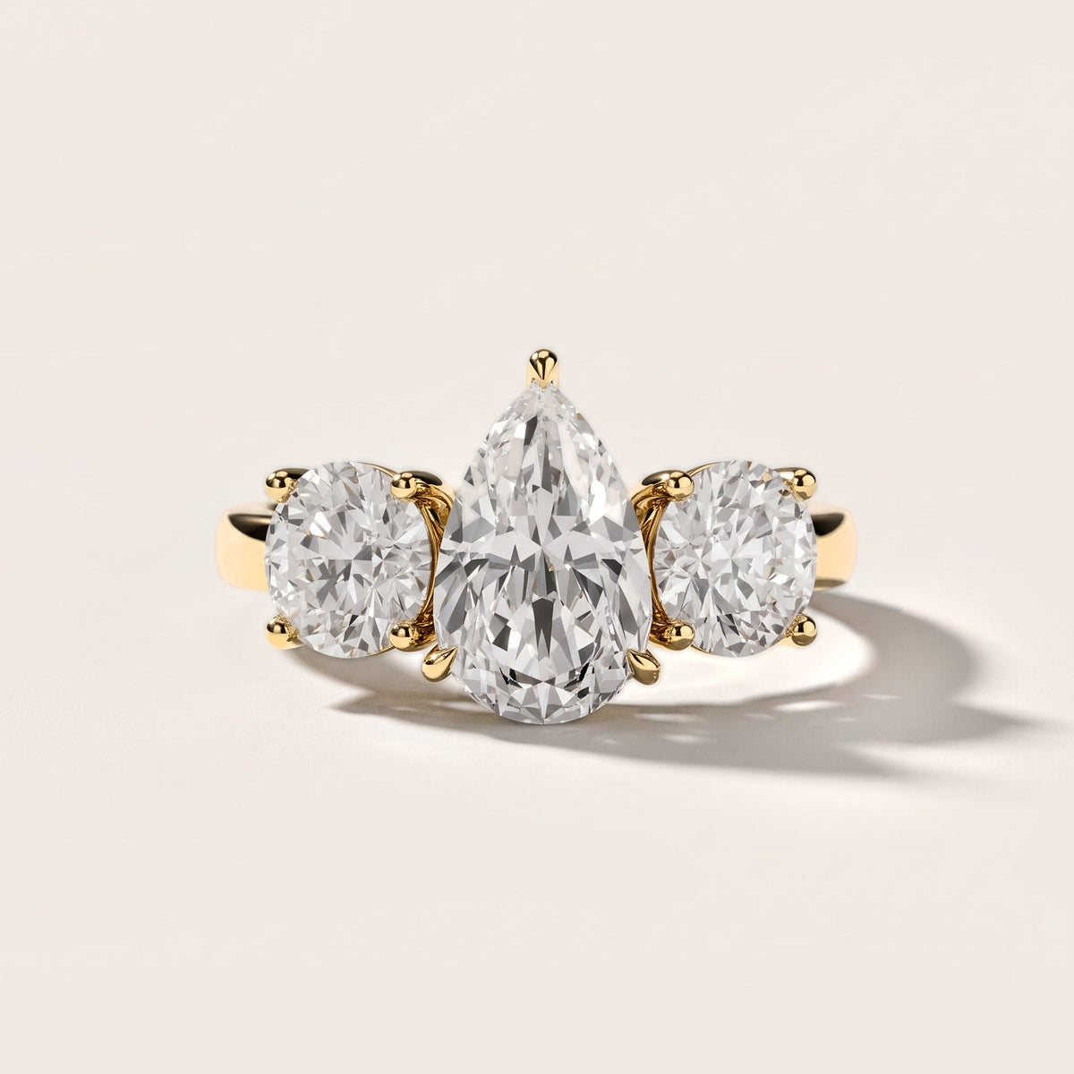 Esme Three-Stone Tapered Pear Diamond Engagement Ring in Yellow Gold [studio-metal-20261024]