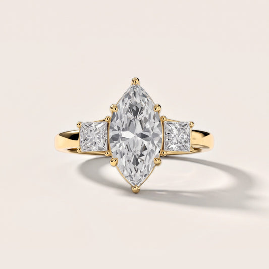 Aria Three-Stone Basket Marquise Diamond Engagement Ring in Yellow Gold [studio-metal-20261024]