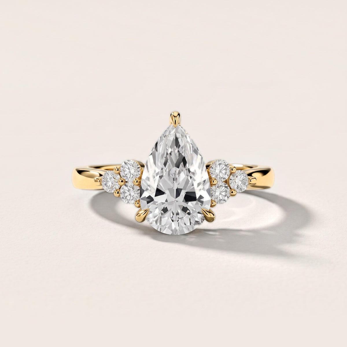 Anya Sidestone Cluster Pear Diamond Engagement Ring in Yellow Gold [studio-metal-20261024]