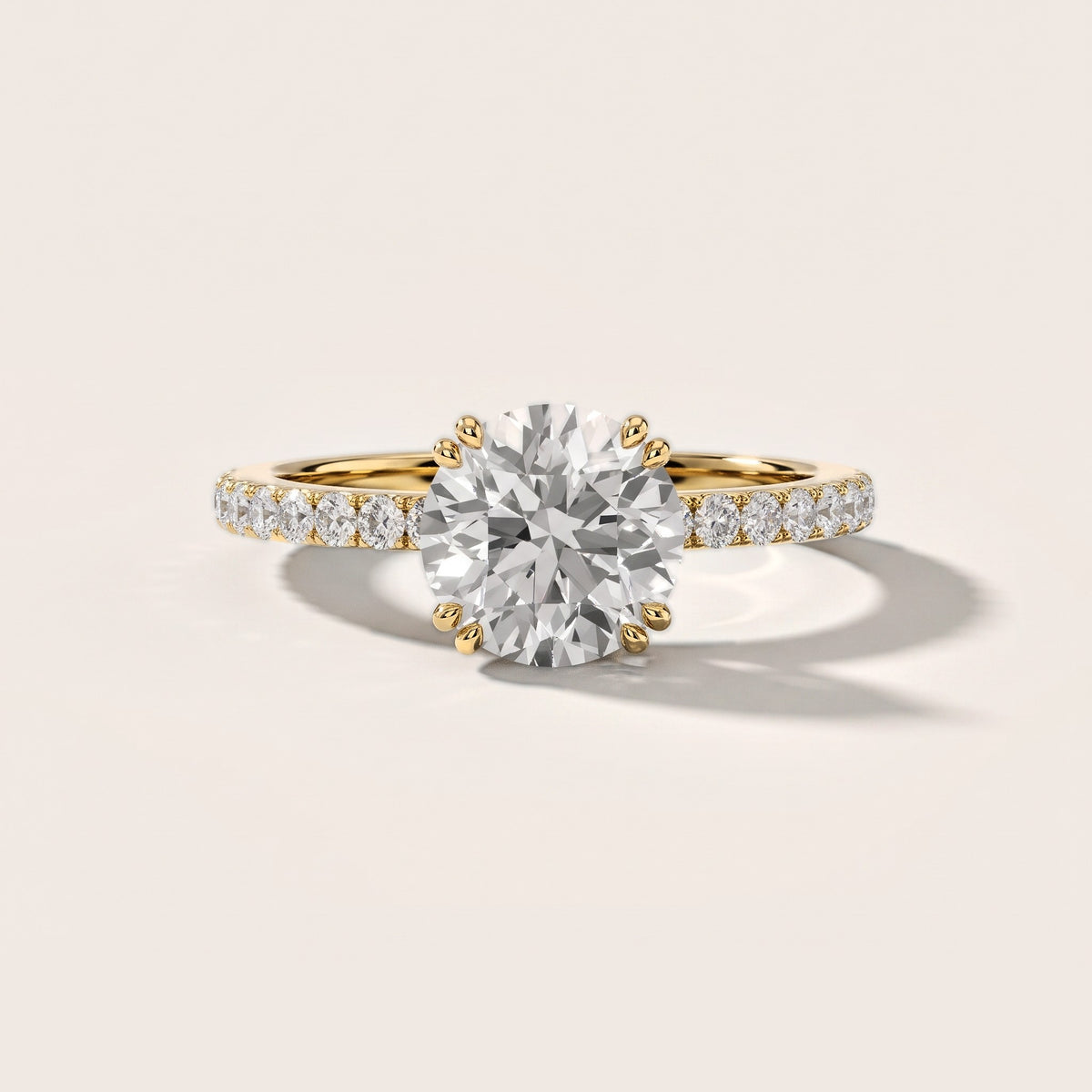Luna Solitaire Pavé Round Diamond Engagement Ring in Yellow Gold [studio-metal-20261024]
