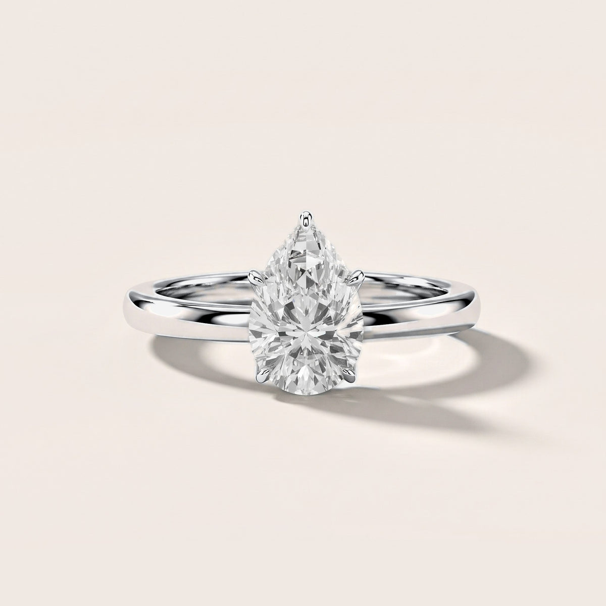 Serena Blossom Solitaire Pear Diamond Engagement Ring in Platinum [studio-metal-20261024]