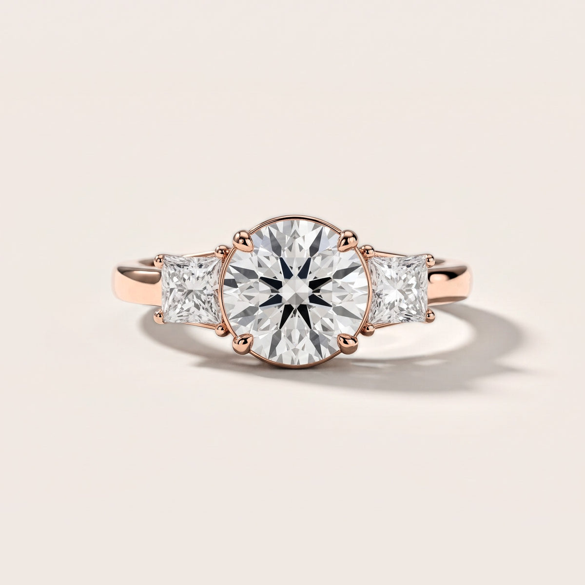 Aria Three-Stone Basket Round Diamond Engagement Ring in Rose Gold [studio-metal-20261024]