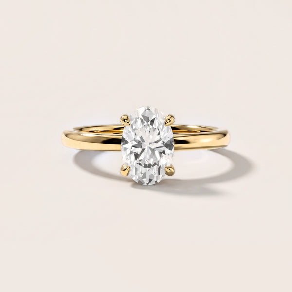 Charlotte Charm Solitaire Oval Diamond Engagement Ring in Yellow Gold