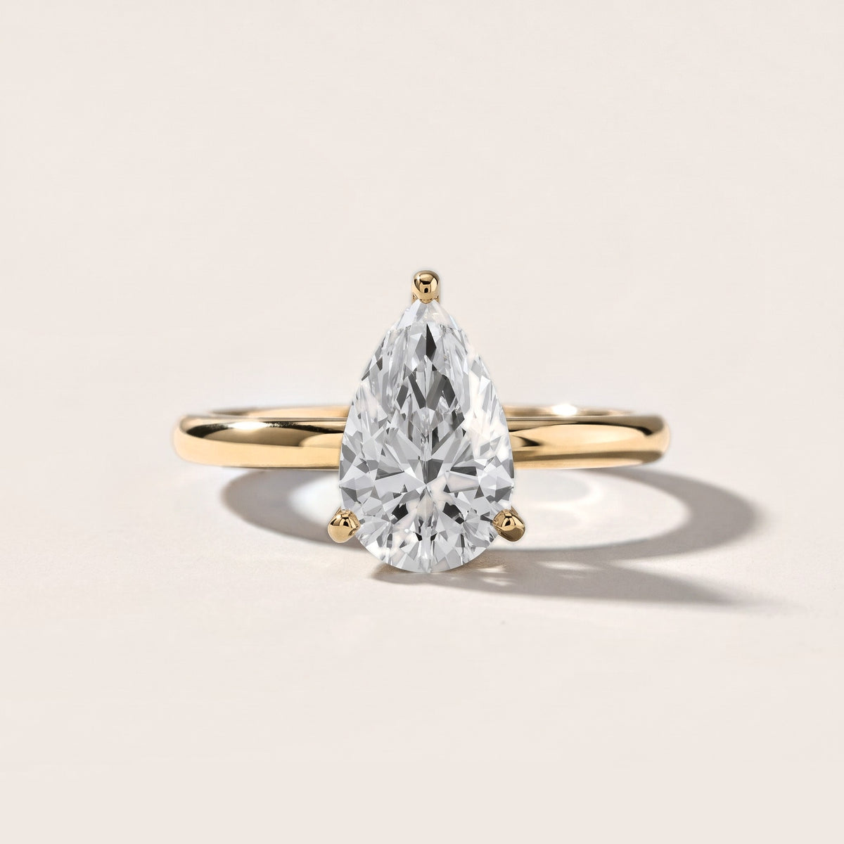 Elena Solitaire Pear Diamond Engagement Ring in Yellow Gold [studio-metal-20261024]