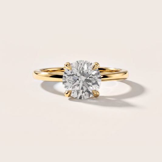 Nella Petite Solitaire Round Diamond Engagement Ring in Yellow Gold [studio-metal-20261024]