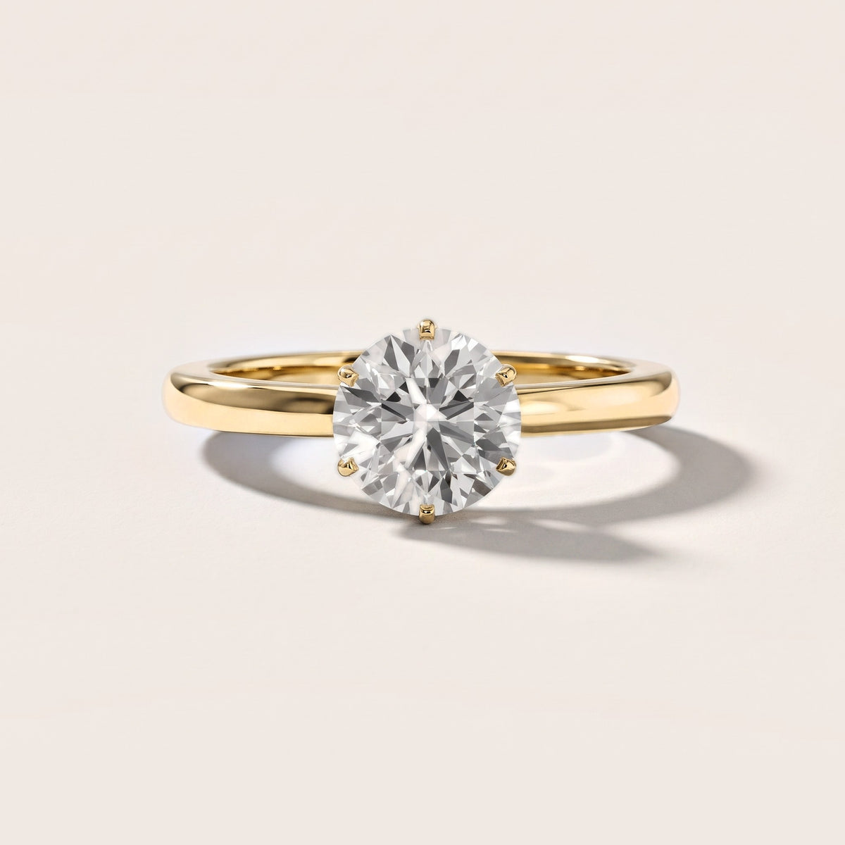 Serena Blossom Solitaire Round Diamond Engagement Ring in Yellow Gold [studio-metal-20261024]