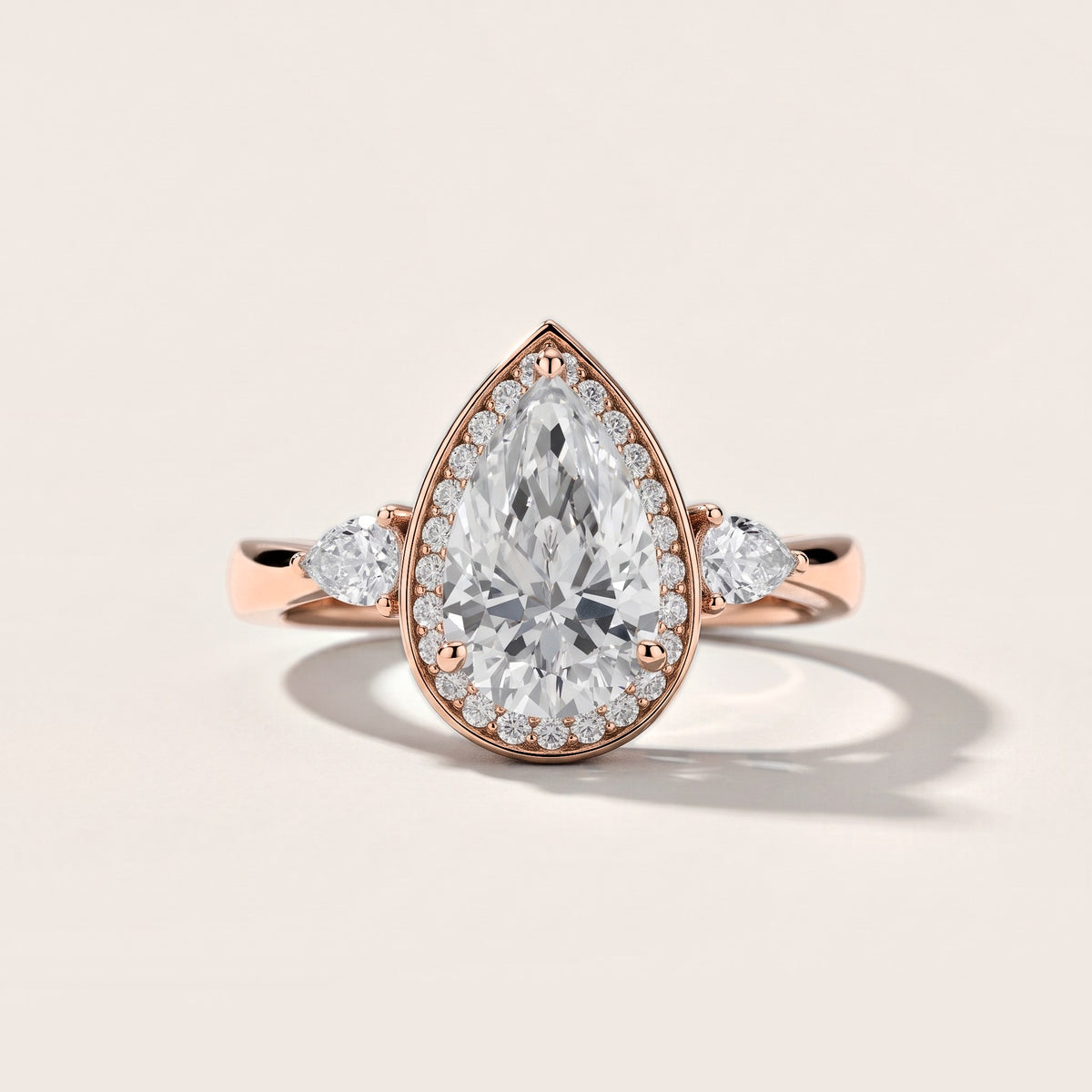 Eliza Halo Sidestone Pear Diamond Engagement Ring in Rose Gold [studio-metal-20261024]
