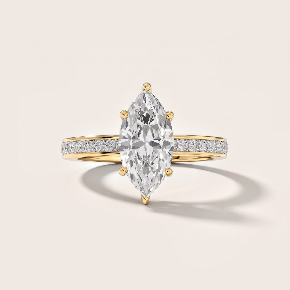 Brielle Channel Set Solitaire Marquise Diamond Engagement Ring in Yellow Gold [studio-metal-20261024]