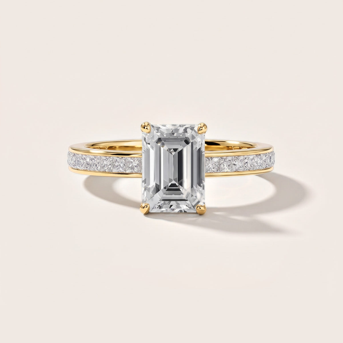 Brielle Channel Set Solitaire Emerald Diamond Engagement Ring in Yellow Gold [studio-metal-20261024]