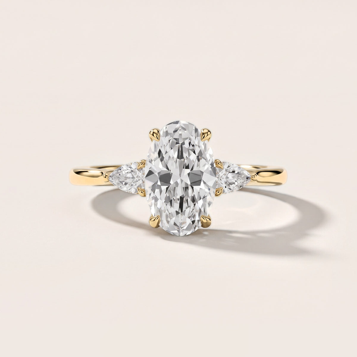 Leila Three-Stone Oval Diamond Engagement Ring in Yellow Gold [studio-metal-20261024]
