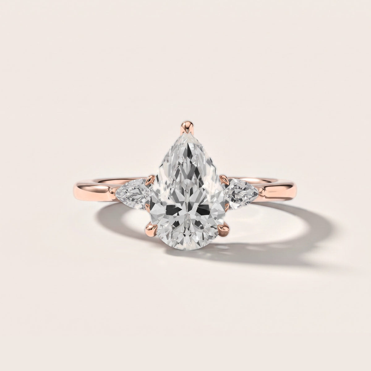 Leila Three-Stone Pear Diamond Engagement Ring in Rose Gold [studio-metal-20261024]