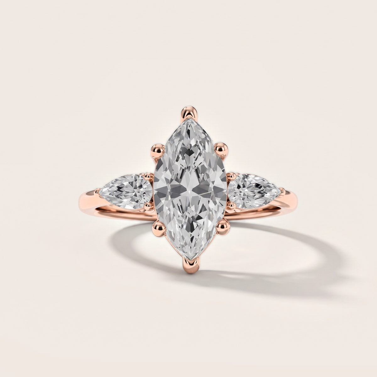Faye Three-Stone Trellis Marquise Diamond Engagement Ring in Rose Gold [studio-metal-20261024]