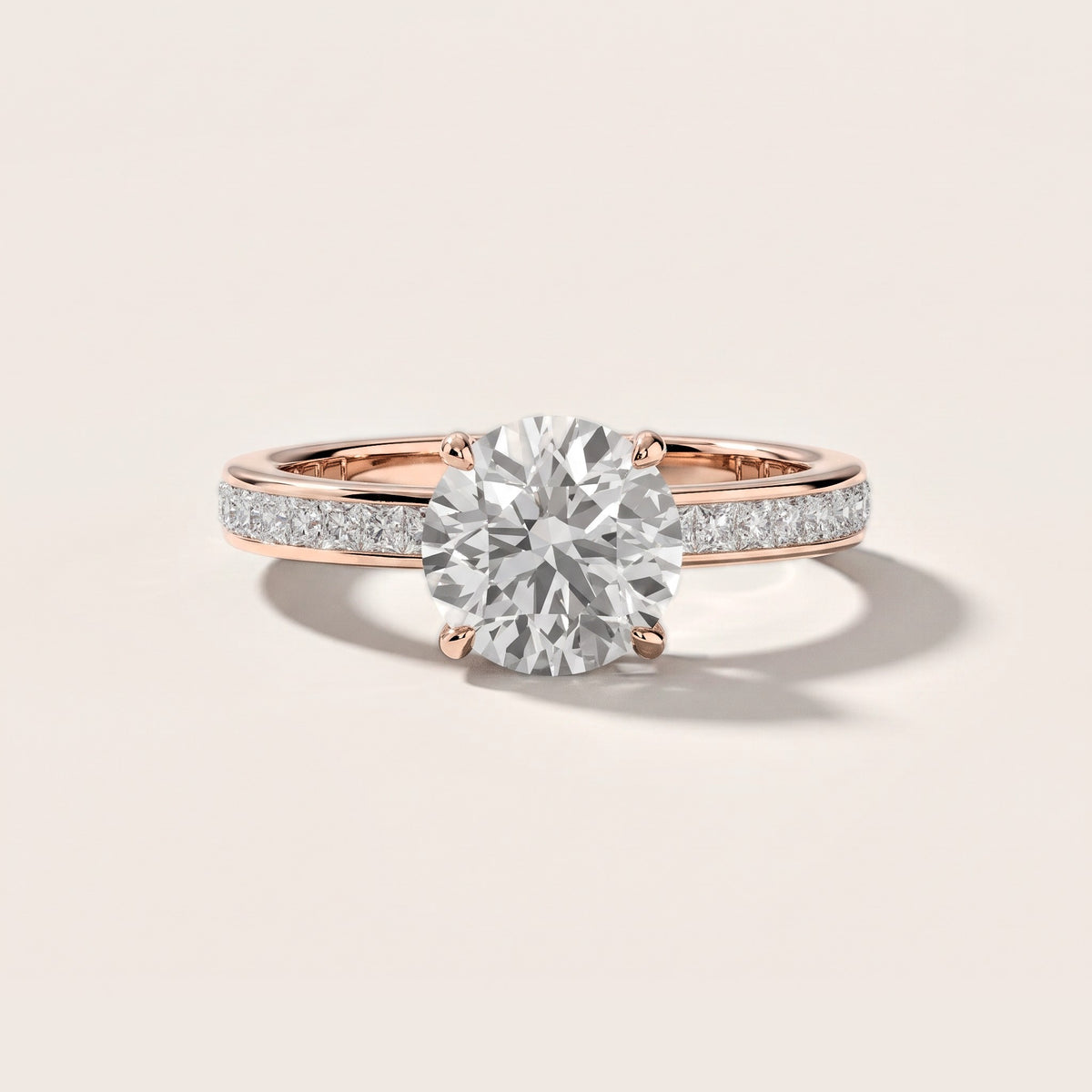 Brielle Channel Set Solitaire Round Diamond Engagement Ring in Rose Gold [studio-metal-20261024]