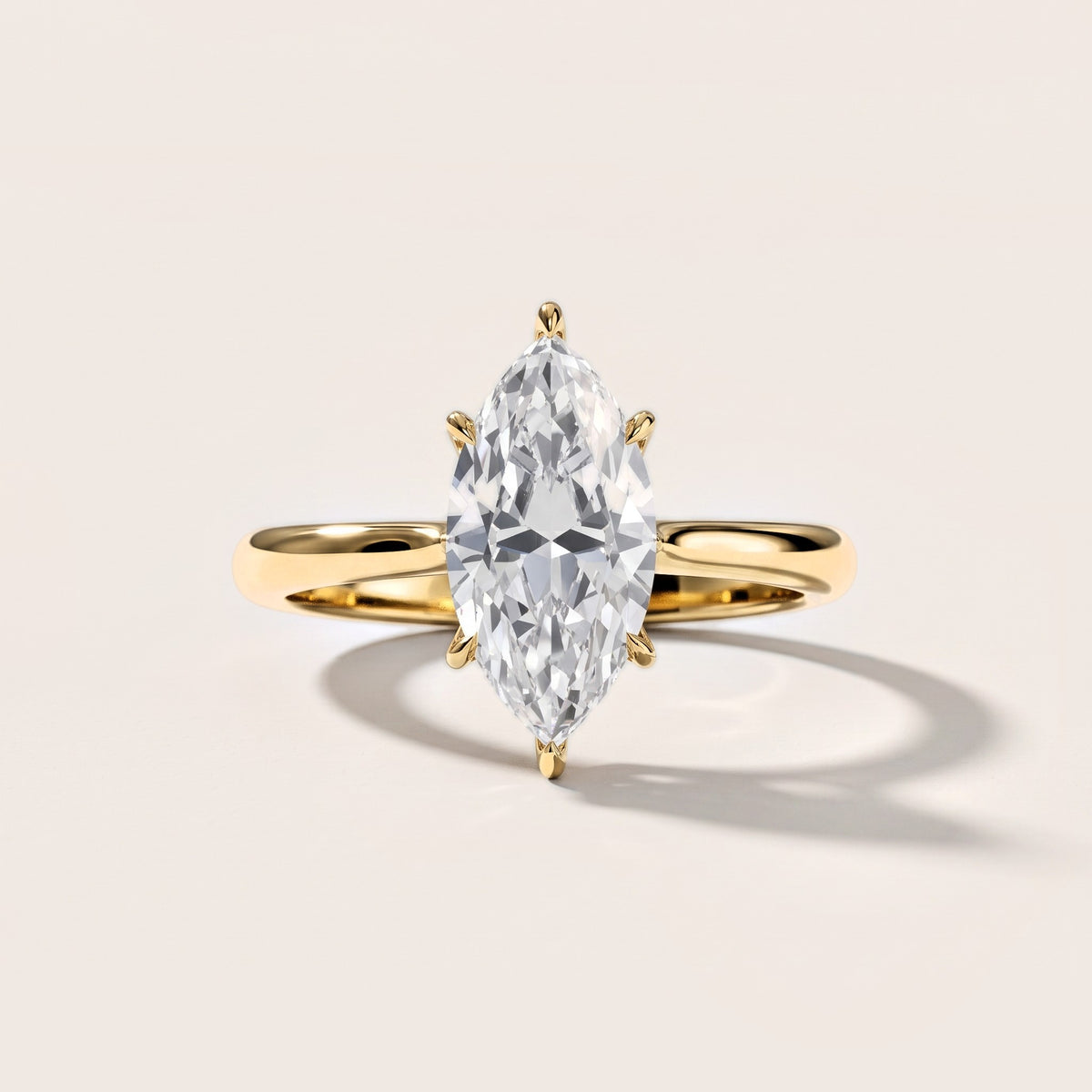 Evie Solitaire Six-Prong Marquise Diamond Engagement Ring in Yellow Gold [studio-metal-20261024]