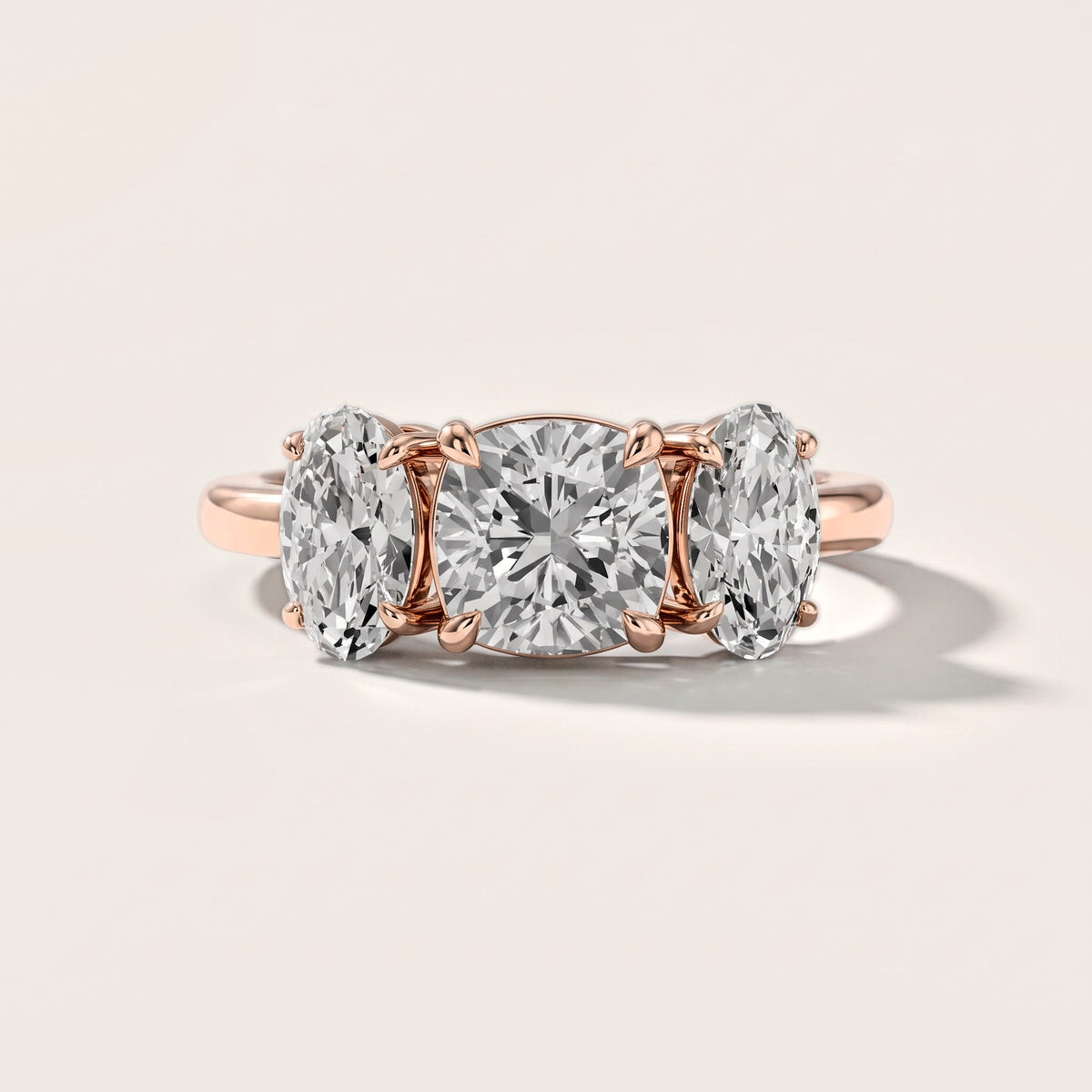 Lila Three-Stone Cushion Diamond Engagement Ring in Rose Gold [studio-metal-20261024]