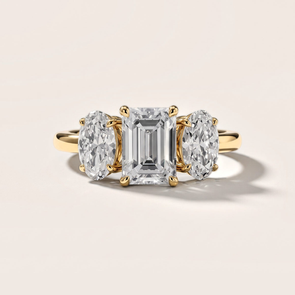 Lila Three-Stone Emerald Diamond Engagement Ring in Yellow Gold [studio-metal-20261024]
