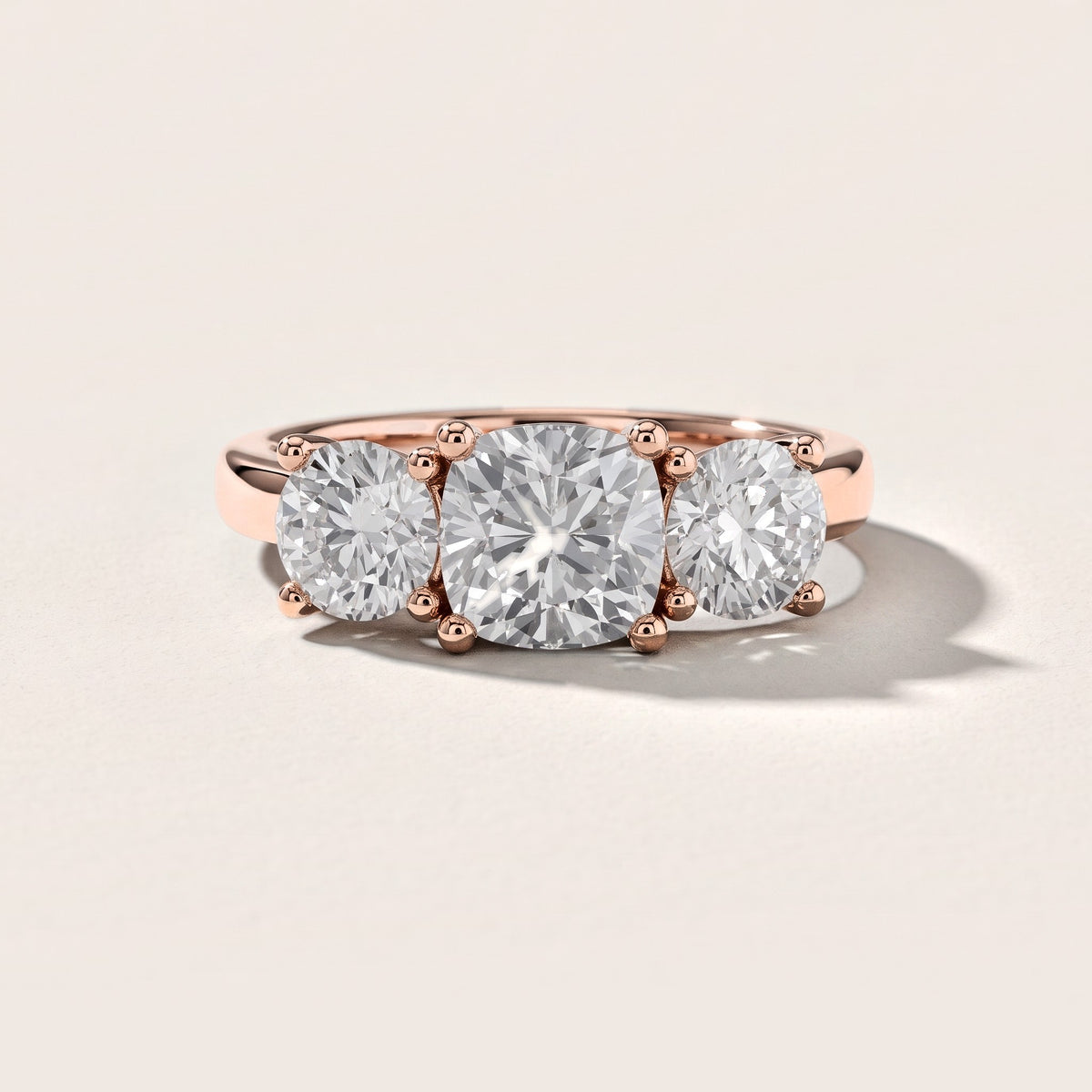 Callie Three-Stone Trellis Cushion Diamond Engagement Ring in Rose Gold [studio-metal-20261024]
