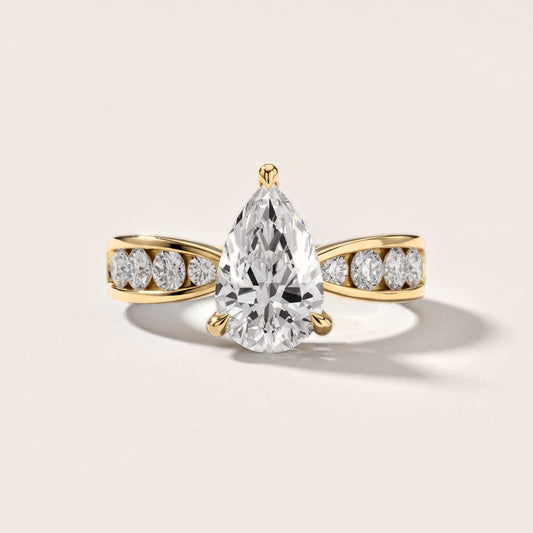 Rosalie Channel Set Sidestone Pear Diamond Engagement Ring in Yellow Gold [studio-metal-20261024]