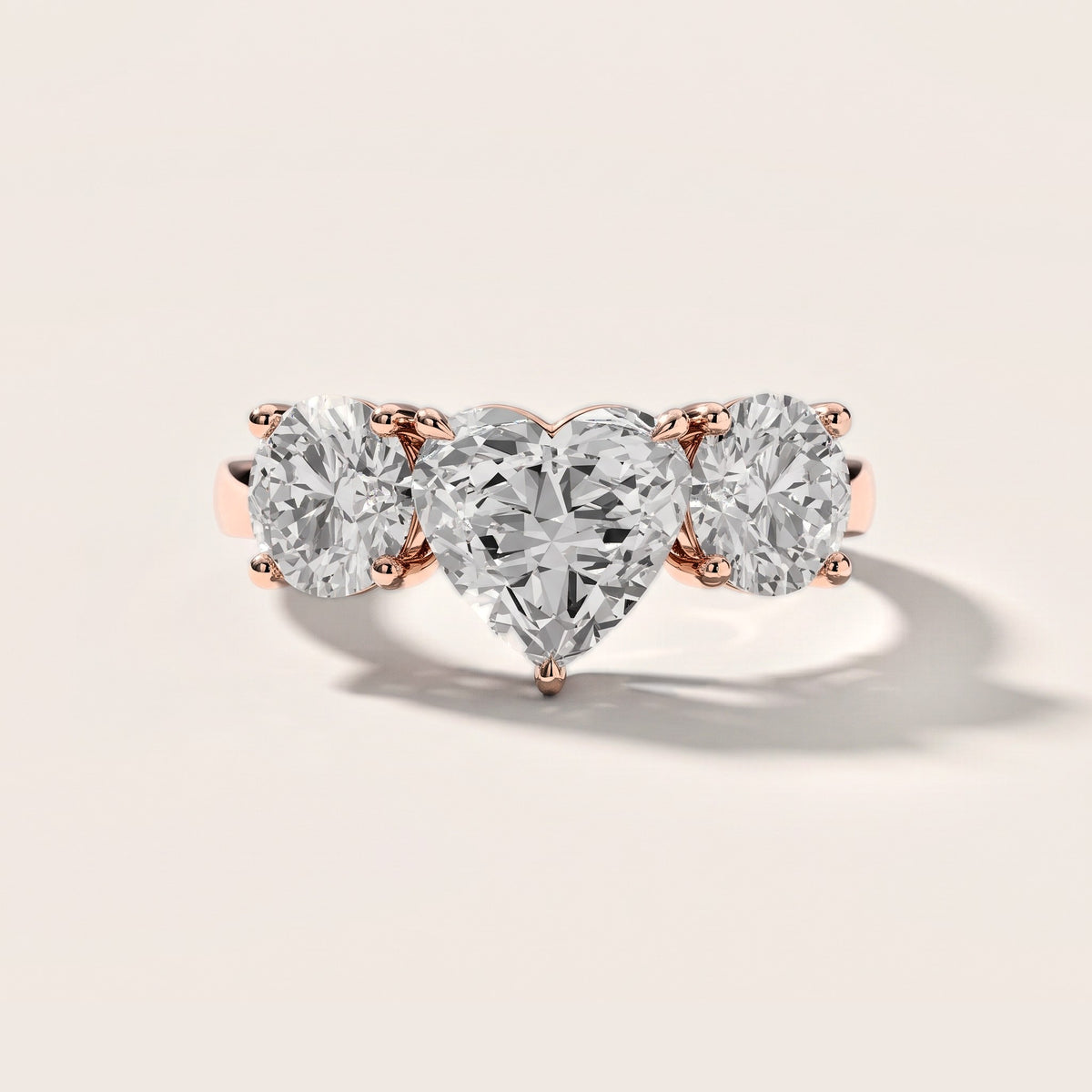 Esme Three-Stone Tapered Heart Diamond Engagement Ring in Rose Gold [studio-metal-20261024]