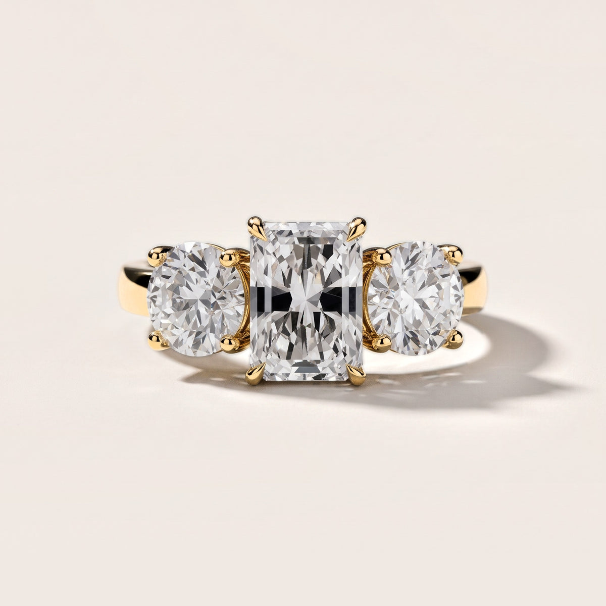 Esme Three-Stone Tapered Emerald Diamond Engagement Ring in Yellow Gold [studio-metal-20261024]