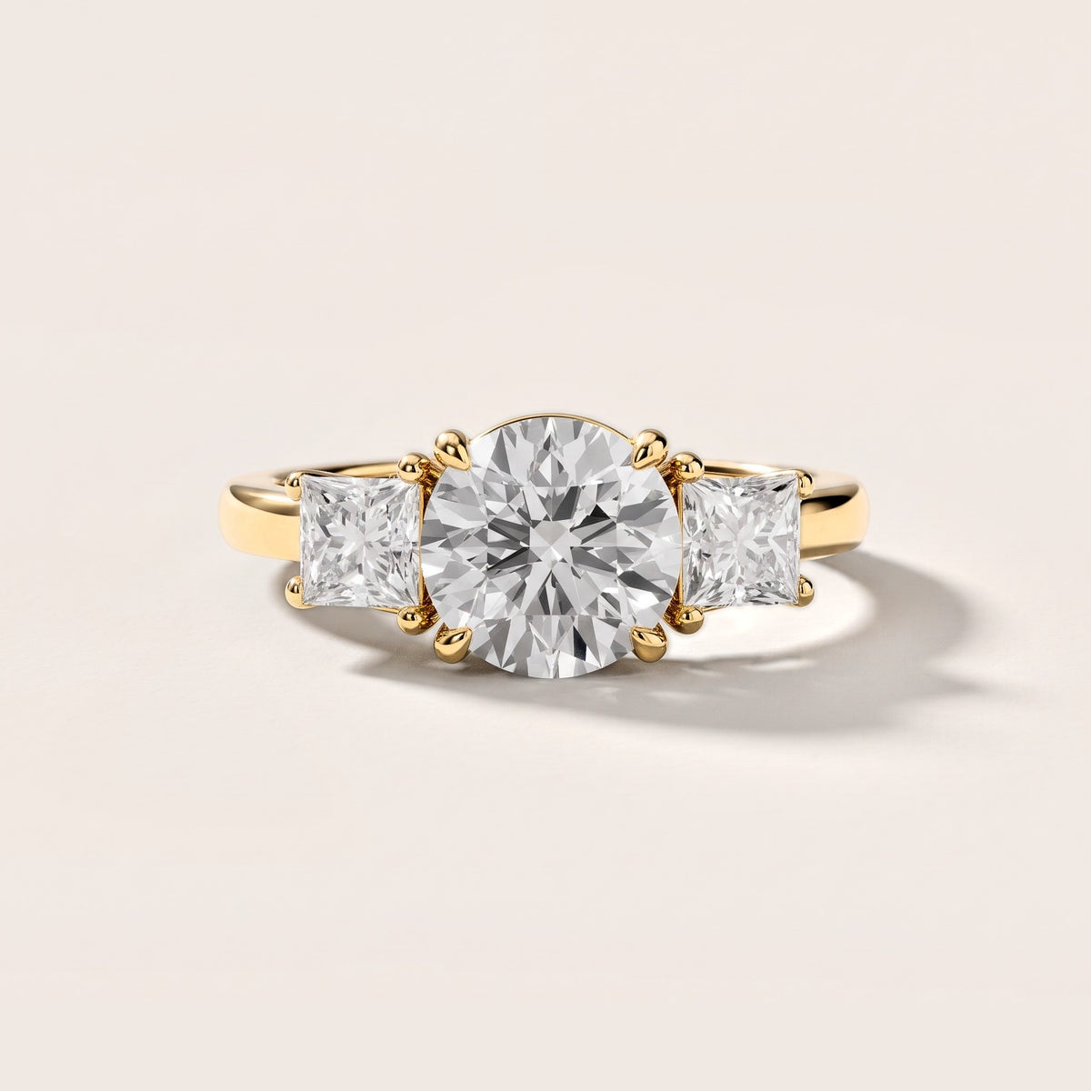 Sienna Three-Stone Round Diamond Engagement Ring in Yellow Gold [studio-metal-20261024]