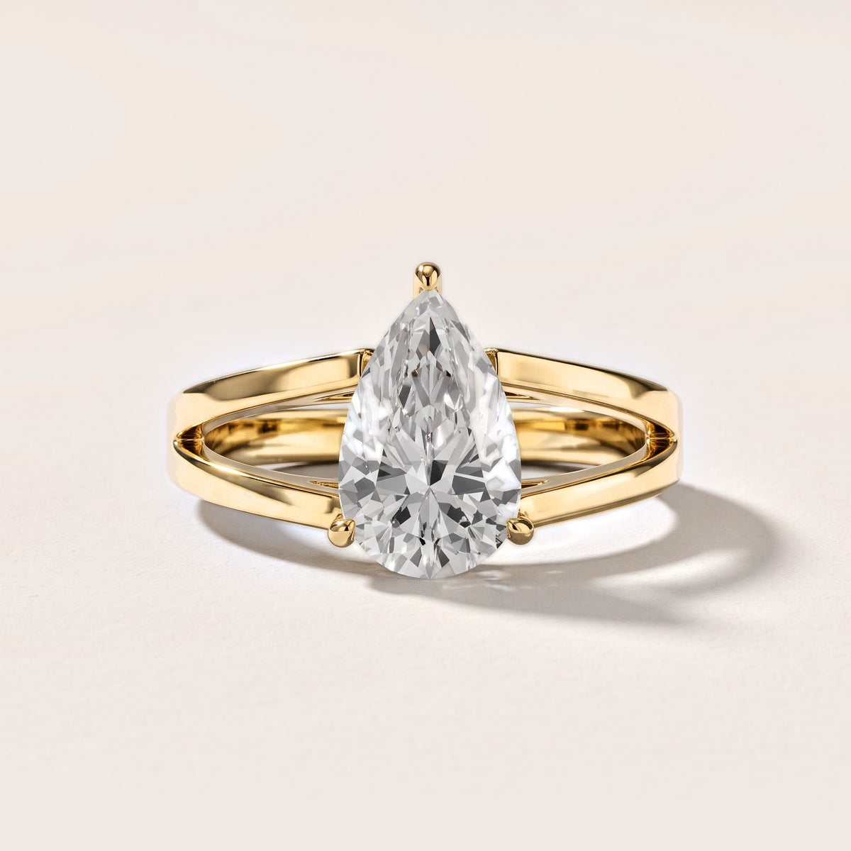 Giselle Solitaire Split Shank Pear Diamond Engagement Ring in Yellow Gold [studio-metal-20261024]