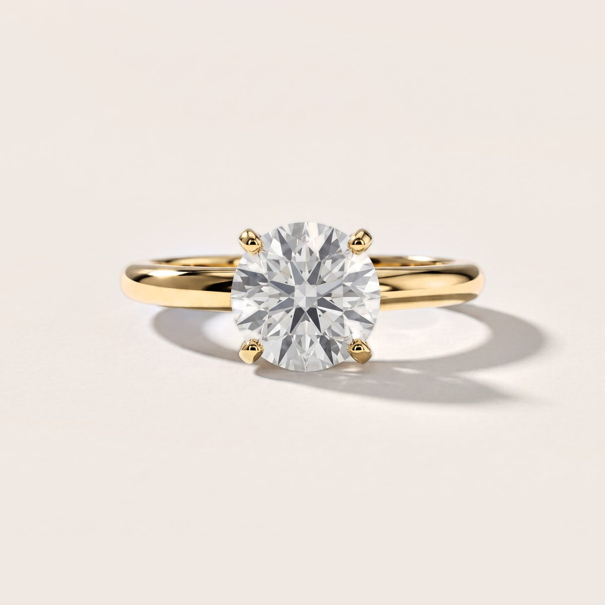 Elena Solitaire Round Diamond Engagement Ring in Yellow Gold [studio-metal-20261024]