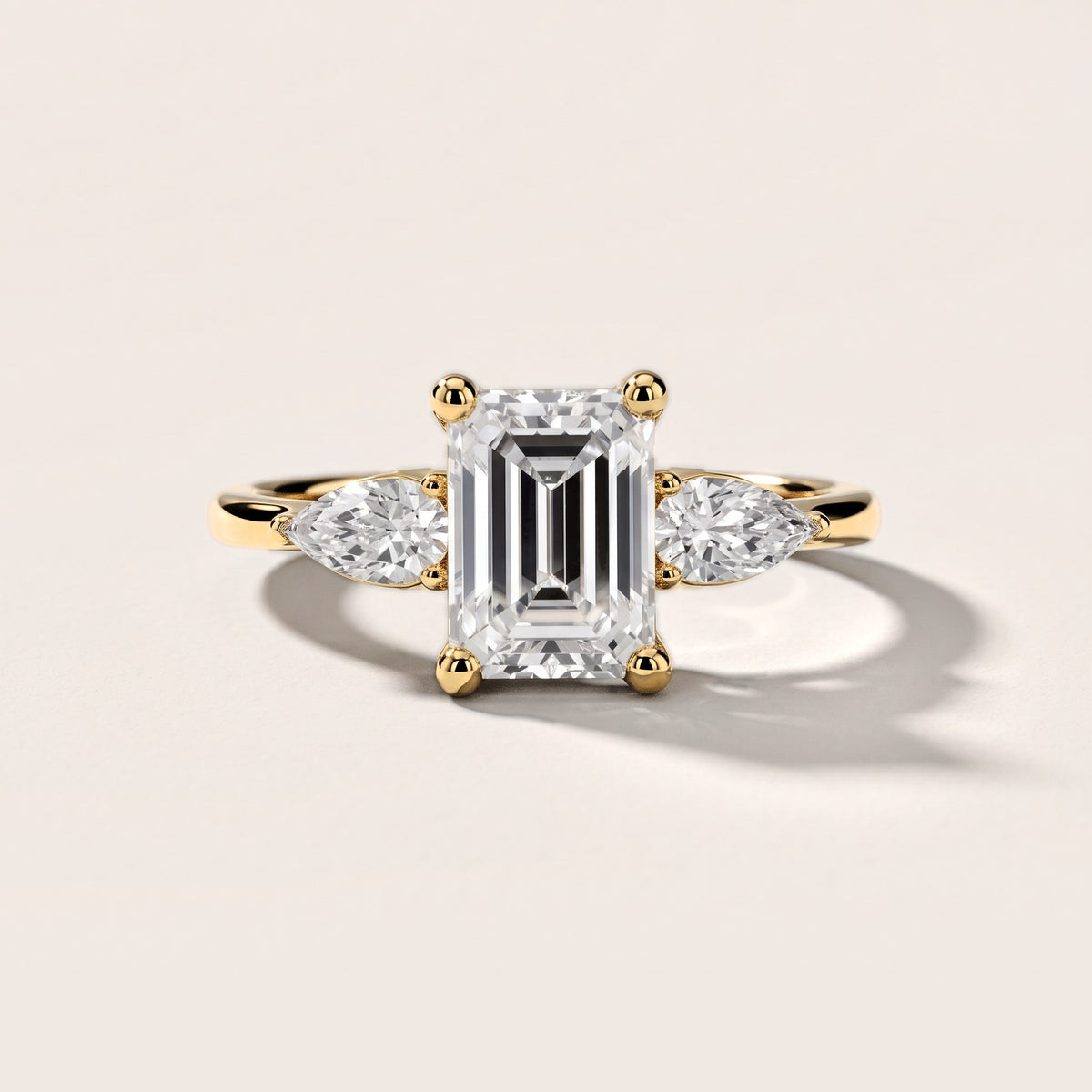 Faye Three-Stone Trellis Emerald Diamond Engagement Ring in Yellow Gold [studio-metal-20261024]