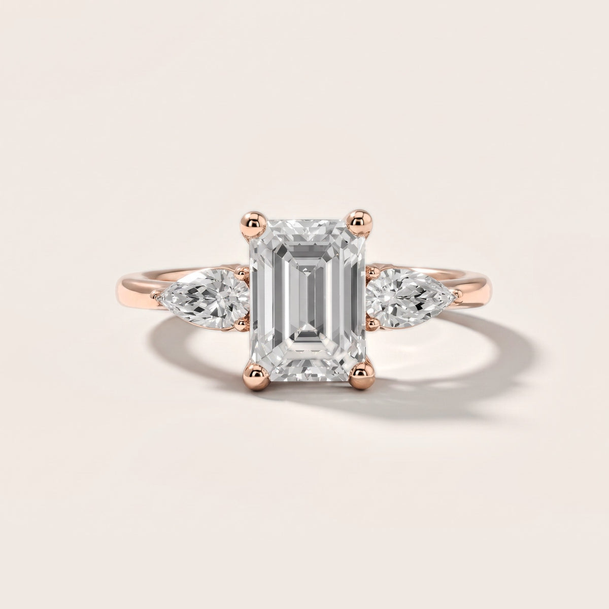 Faye Three-Stone Trellis Emerald Diamond Engagement Ring in Rose Gold [studio-metal-20261024]