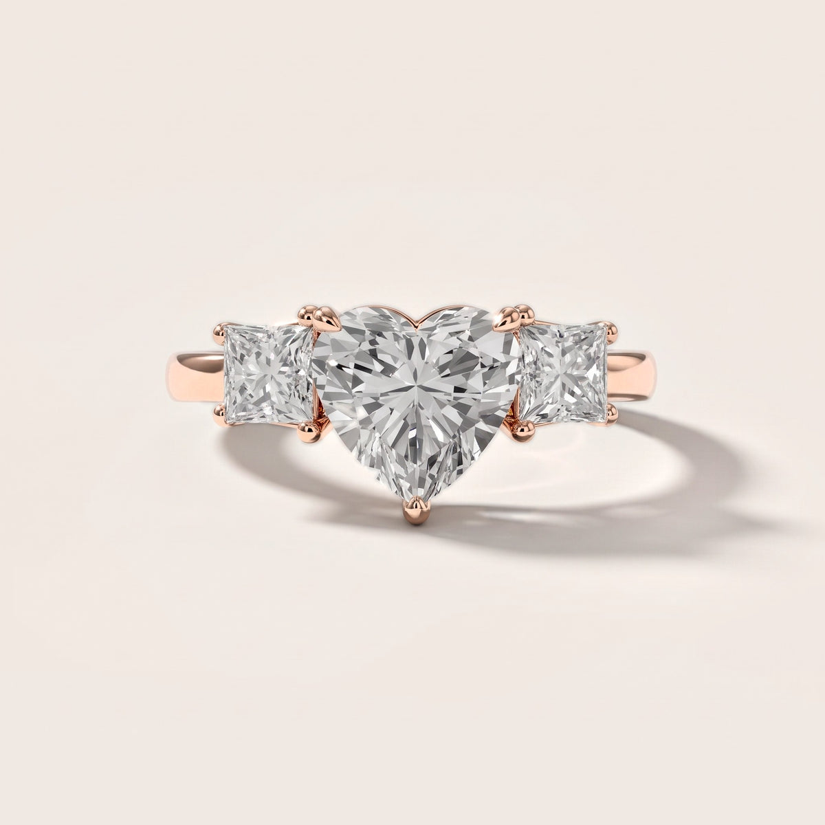 Sienna Three-Stone Heart Diamond Engagement Ring in Rose Gold [studio-metal-20261024]