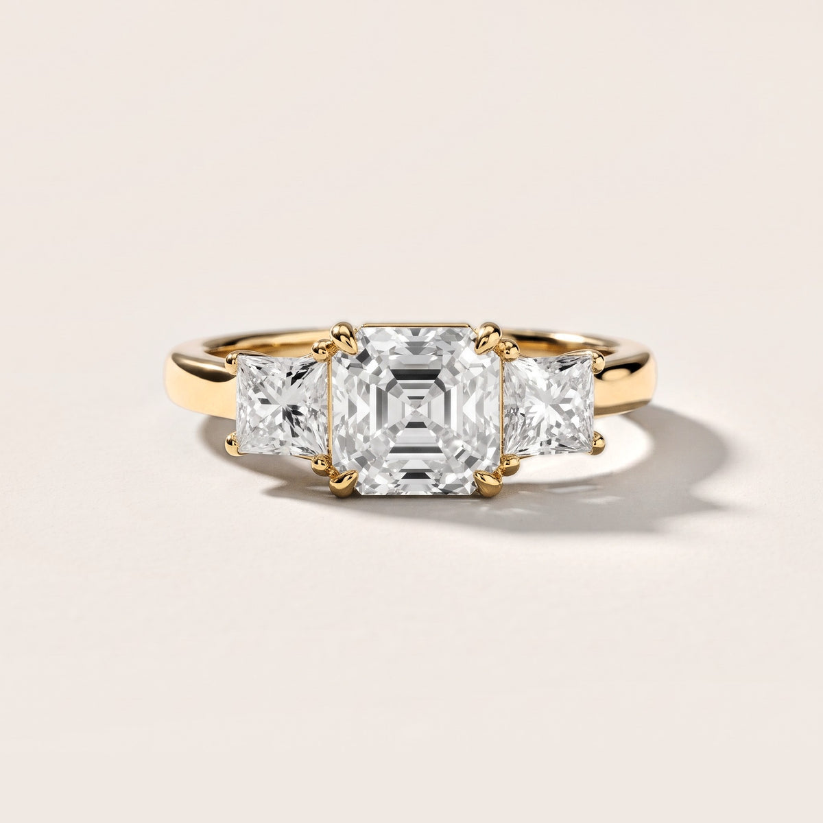 Sienna Three-Stone Asscher Diamond Engagement Ring in Yellow Gold [studio-metal-20261024]
