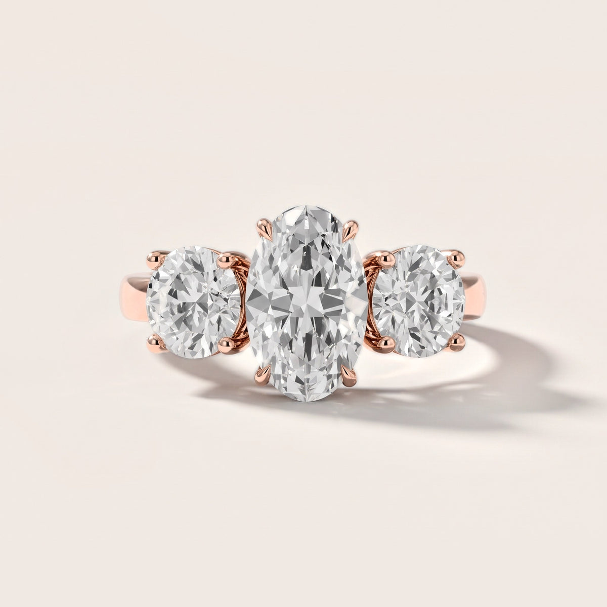 Esme Three-Stone Tapered Oval Diamond Engagement Ring in Rose Gold [studio-metal-20261024]